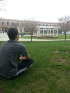 Student Nathaniel Ambrose finding peace of mind before class.  (Photo by Niles Wilson) 